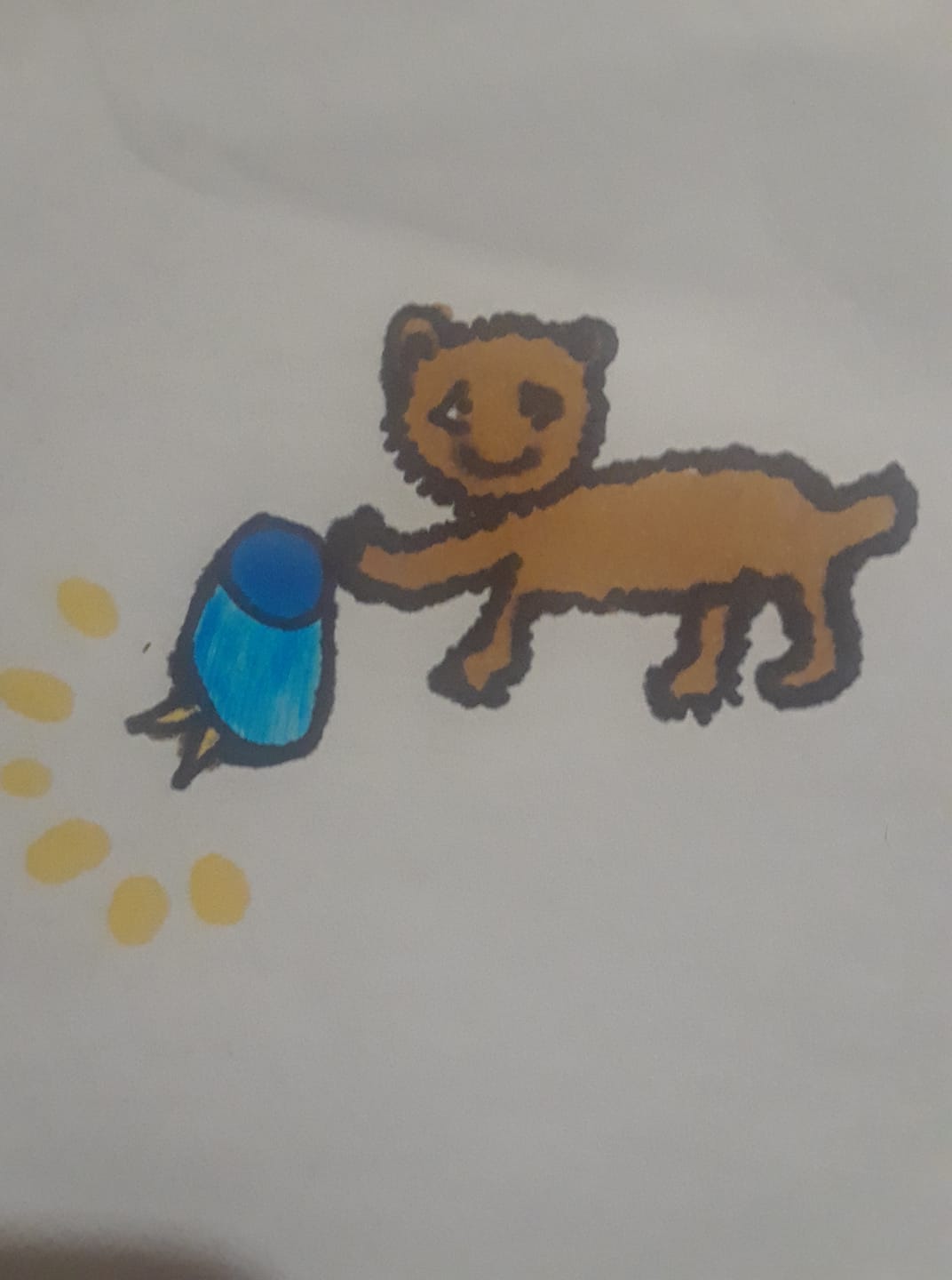 Baby Bear with star under a blue beach bucket